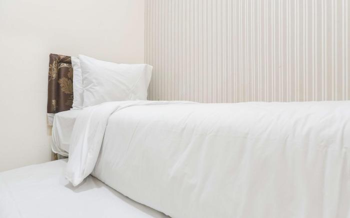 Good Relax 2BR Green Pramuka City Apt By Travelio