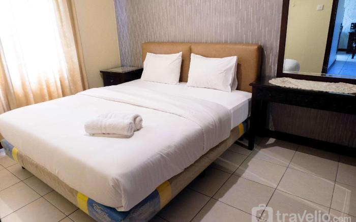 Homey 2BR Mediterania Marina Residence By Travelio