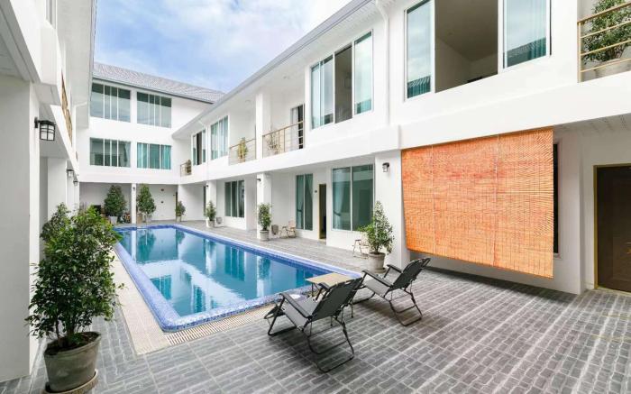 d village condominium