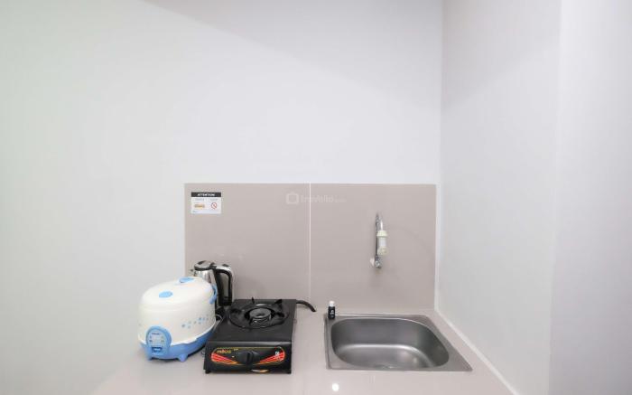 Minimalist Studio @ Transpark Juanda By Travelio
