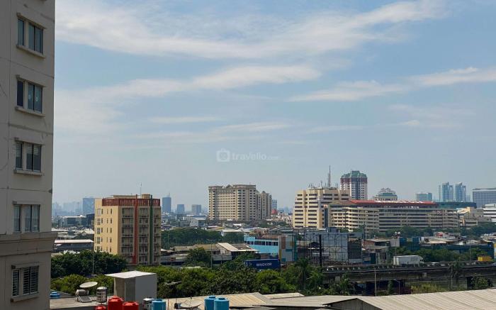 Homey and Warm 2BR at Marina Ancol By Travelio