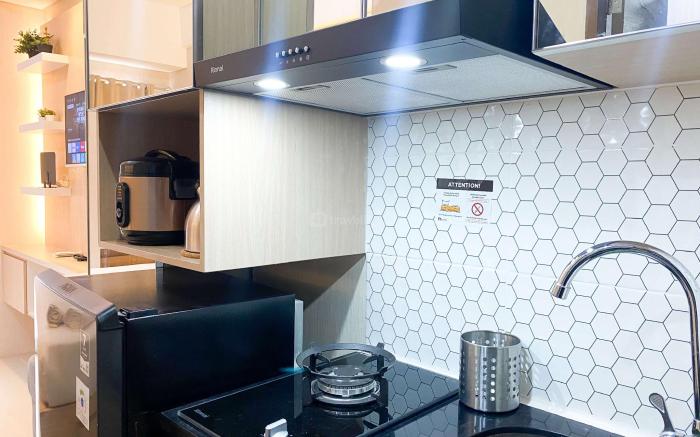 Homey Look Studio @ Transpark Juanda By Travelio