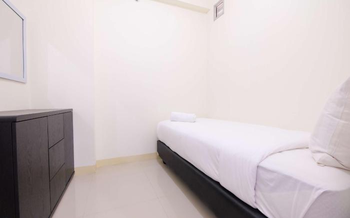 Cozy 2 BR Green Pramuka City Apartment By Travelio