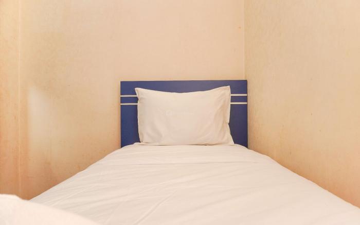 Spacious 3BR at Green Pramuka City By Travelio