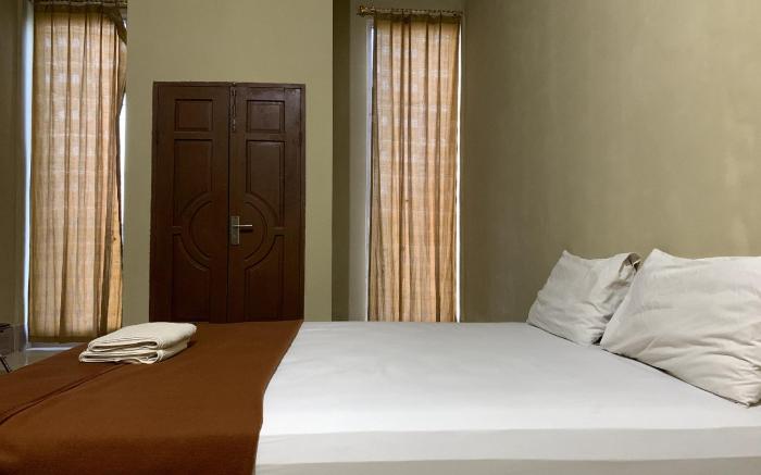 OYO 93876 Athirah Kost Near Permandian Wisata Istana Mappala