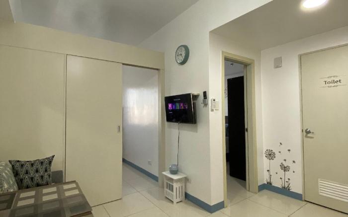 Cozy 2 BR unit @ South Residences Las Pinas (1206)