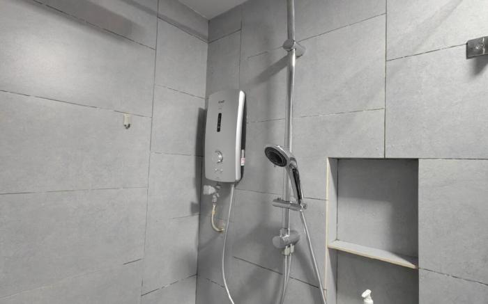 L Homestay Jesselton Quay KK City 14th, near Gaya Street and the Jetty.