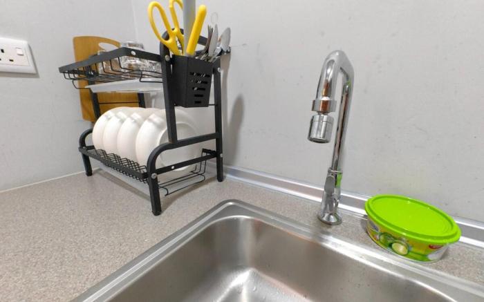 L Homestay Jesselton Quay KK City 14th, near Gaya Street and the Jetty.