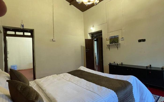 Monkey's Inn by WOOD N MIST - 5 BHK Villa
