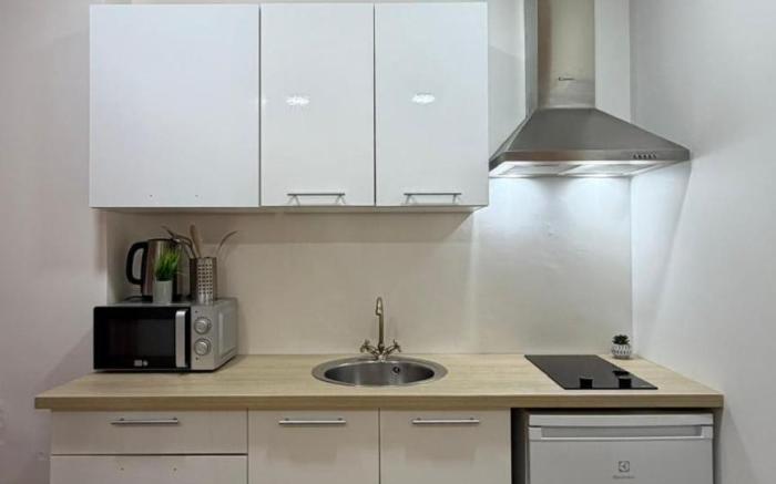 Modern Renovated studio with a touch of gilded glamour central Paris