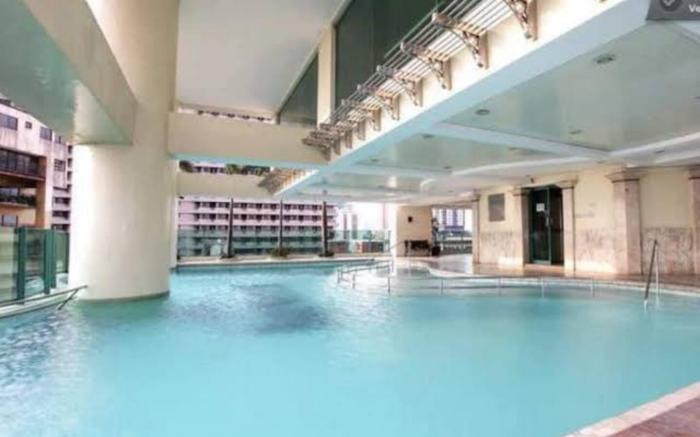 TAN CONDO