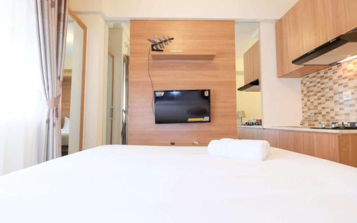 Modern Studio @ Green Pramuka City Apt By Travelio