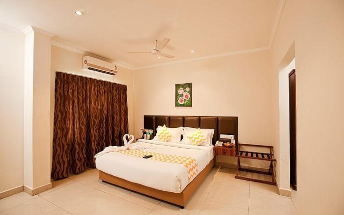 Blossoms Hotel and Service Apartment