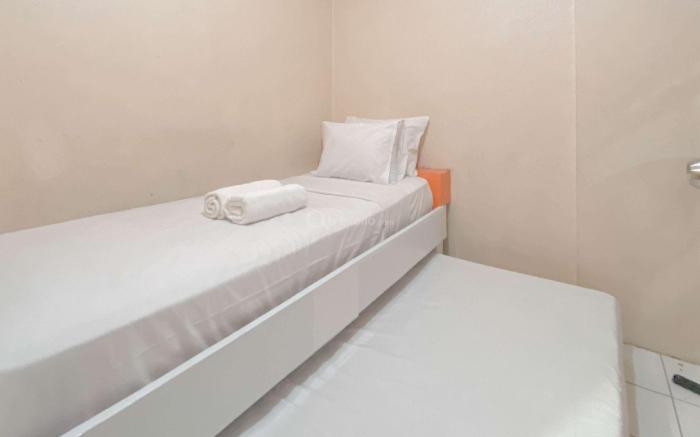 Homey 2BR @ Gateway Ahmad Yani Cicadas By Travelio