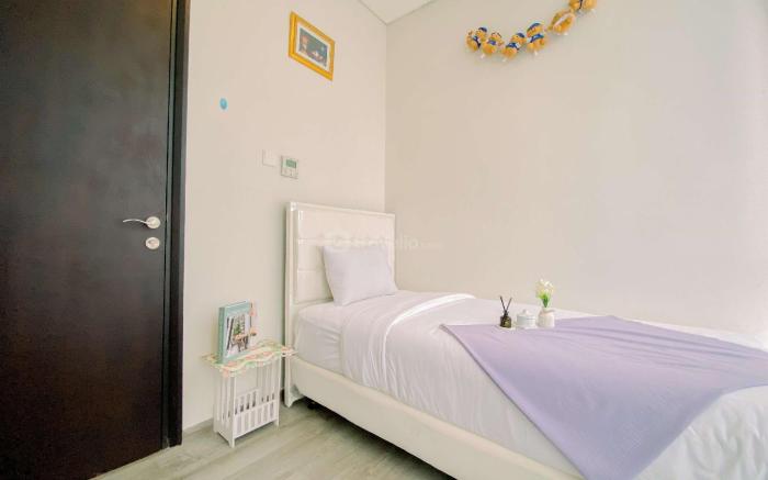 Comfort & Homey 2BR at Sudirman Suites By Travelio