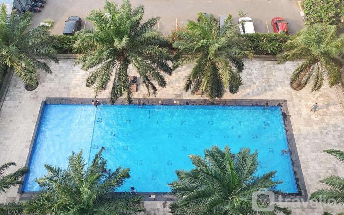 Relaxing 2BR Mutiara Bekasi Apartment By Travelio