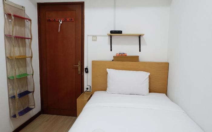 Apt 3BR  at Sudirman Tower Condominium By Travelio