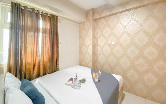 Tranquil Homey 2BR Green Pramuka City By Travelio