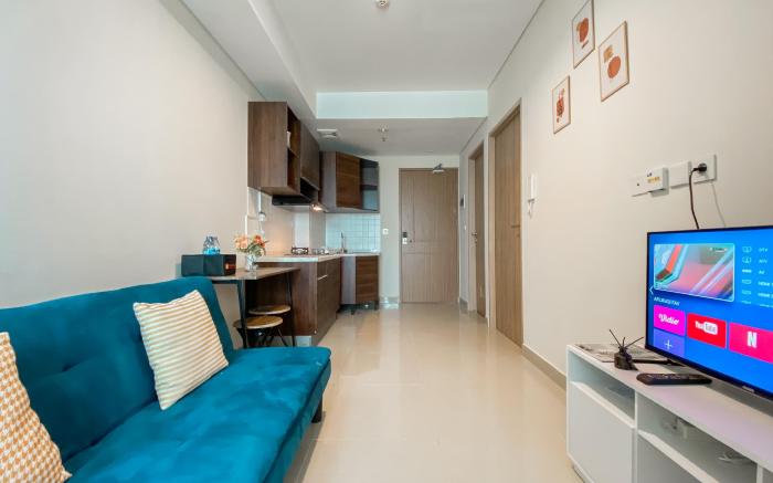 Comfort & Well 2BR at Tamansari Iswara By Travelio