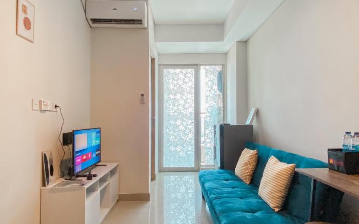 Comfort & Well 2BR at Tamansari Iswara By Travelio