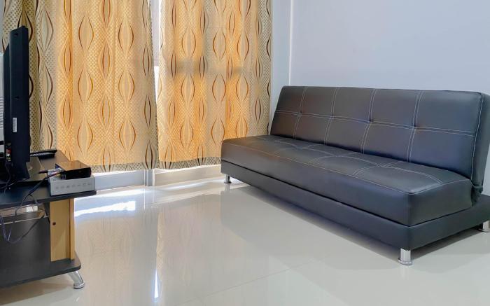 Homey 2BR Apt at Royal Olive Residence By Travelio