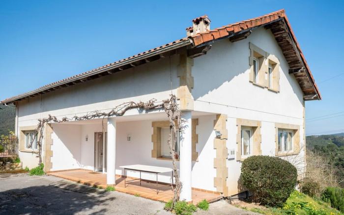 Casa con jardín en Gama