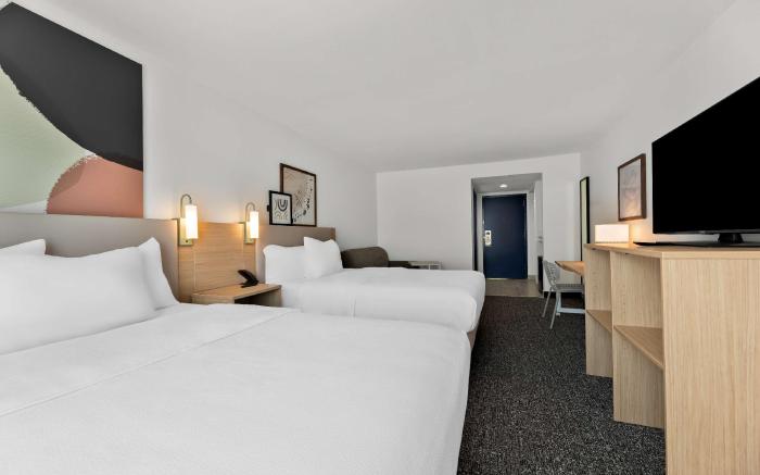 Spark by Hilton Tupelo