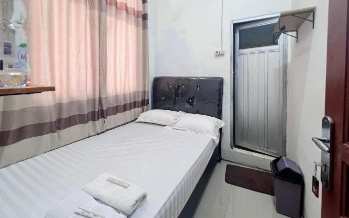 Penginapan Dheas Mitra RedDoorz