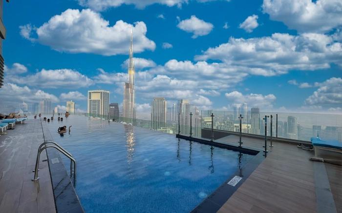 55th Floor 2BR with Burj View & Infinity Pool
