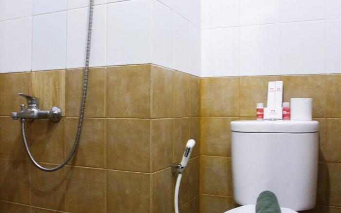 Well Designed 2BR Green Pramuka Apt By Travelio