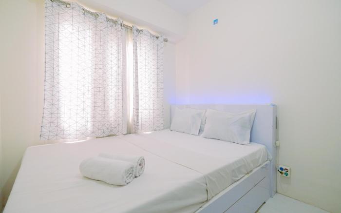 Homey 2BR Apartment Podomoro Golf View By Travelio