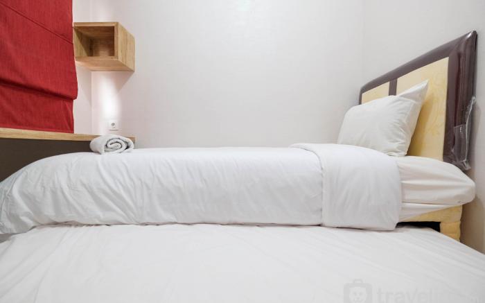Modern and Cozy 2BR Podomoro Golf View By Travelio