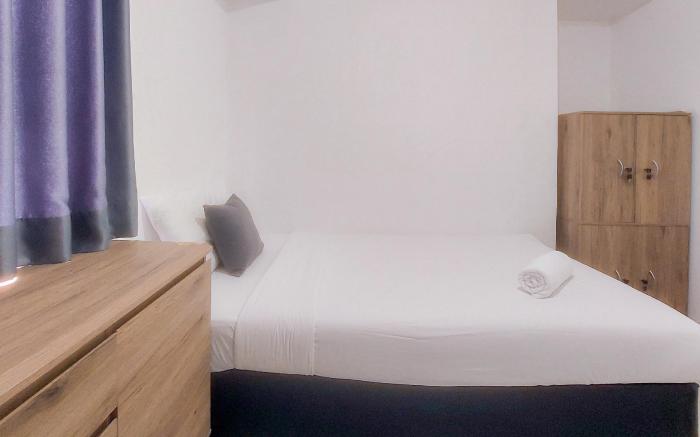 Simply Homey 2BR Urbantown Serpong Apt by Travelio