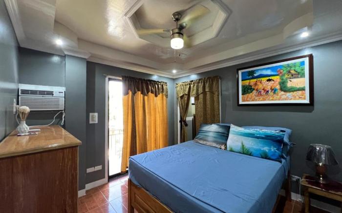 Lovely Bedroom in Lila, Bohol with WIFI, AC & Ref