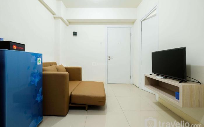 Cozy 2BR Green Pramuka Apartment By Travelio