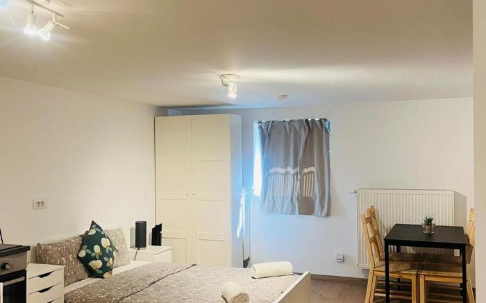 Cozy Basement Fashion District by OneLuxStay