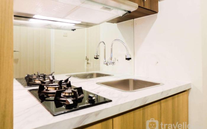 Elegant Studio Grand Kamala Lagoon Apt By Travelio