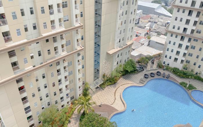 Minimalist 1BR Apt Vittoria Residence By Travelio