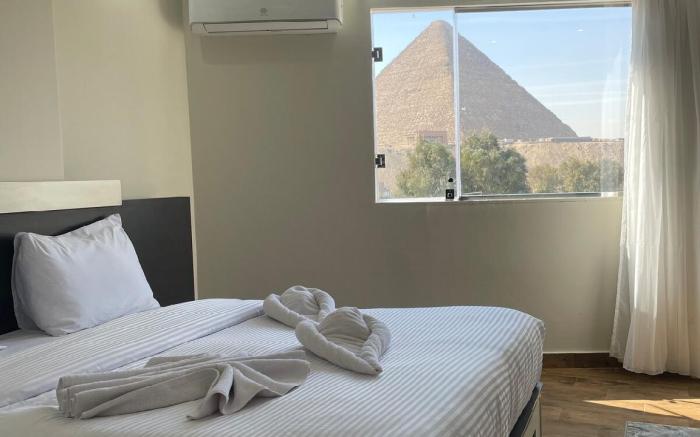 Khufu’s Green Pyramids View