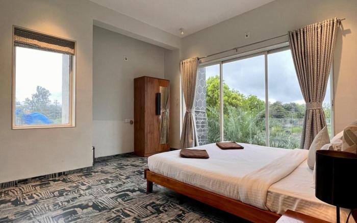 Touchwood 4BHK with Pvt Pool by Stellar Stays