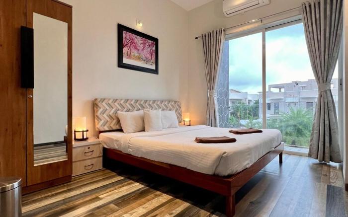 Touchwood 4BHK with Pvt Pool by Stellar Stays