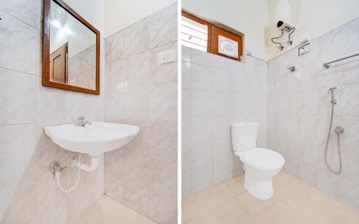 Super Hotel O Pathanamthitta Near Mahatma Gandhi Statue