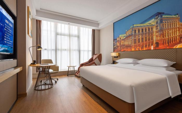 Vienna International Hotel Baolong Metro Station