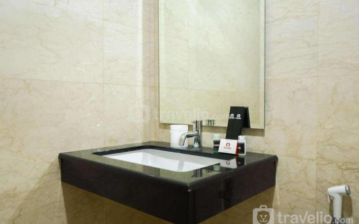 2BR with Study Room at L'Avenue Apt By Travelio