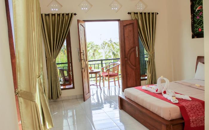 Ancut Sari in the rice fields Room 2 & AC