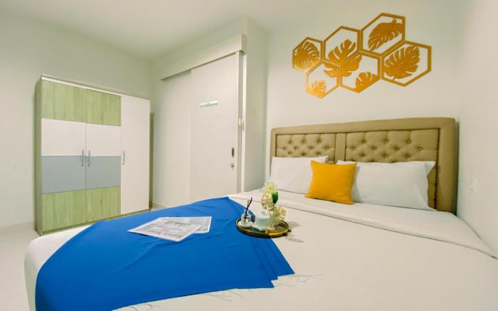 Modern Look 1BR at Sentul Tower Apt By Travelio