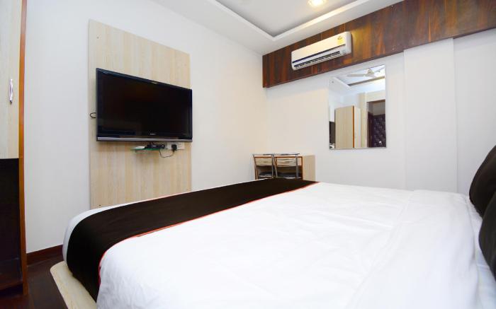 Collection O 30112 Hotel Pearl Inn & Suites