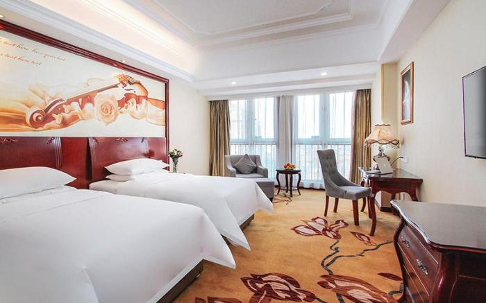 Vienna International Hotel Jiangsu Taixing Huangqiao Jiayuan Plaza