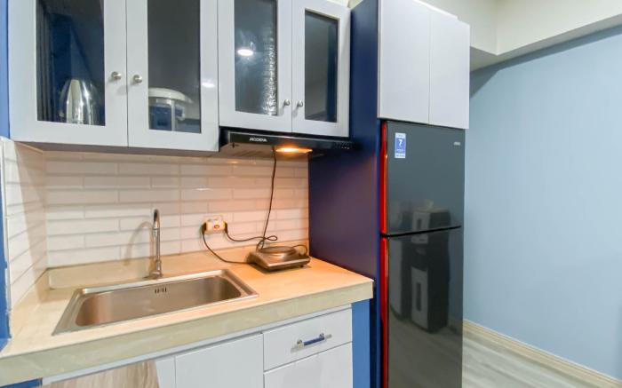 Spacious Cozy 2BR at Apt Meikarta By Travelio