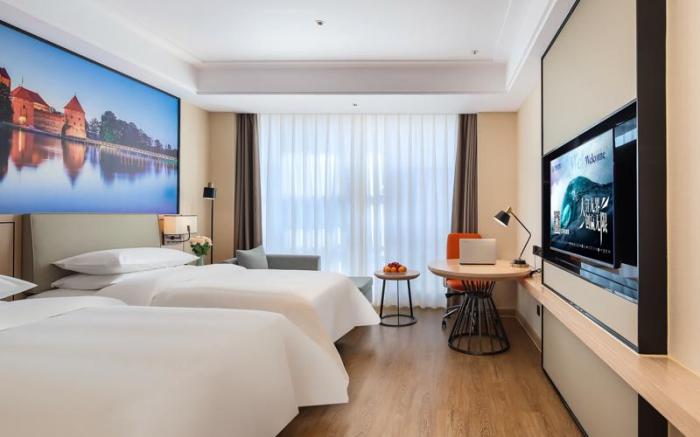 Vienna International Hotel Henan Zhoukou Luyi Passenger West Station